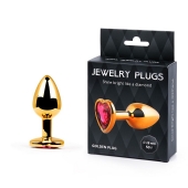 Золотистая анальная пробка с малиновым кристаллом-сердечком - 7 см. - Anal Jewelry Plug - купить с доставкой в Находке